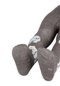 Brown knit socks with a ghost pattern, featuring reinforced toes and cuffs for durability. Soft, stretchy texture suitable for casual wear.