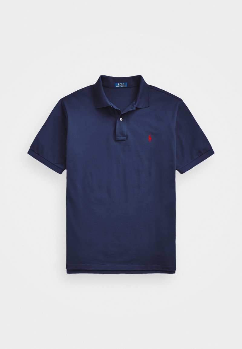 Marineblått polo skjorte laget av bomull, med en to-knaps placket og en liten rød logo på brystet. Glatt tekstur, korte ermer.
