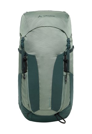 Grüner Rucksack mit einer strukturierten Oberfläche, ausgestattet mit dunkelgrünen Akzenten, verstellbaren Trägern und einem Reißverschlussfach. Das Logo ist oben angebracht.