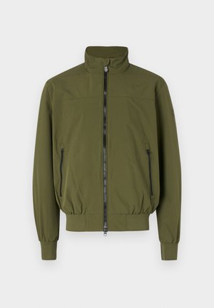 Olive green jacket with a stand-up collar, zip front closure, and two side zip pockets; made from smooth, lightweight fabric.
