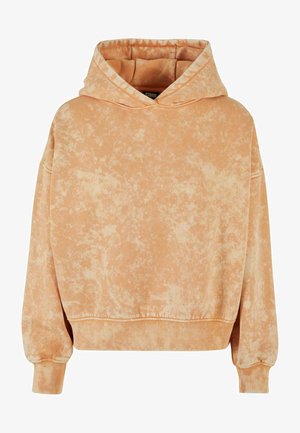 Bluza z kapturem w wyblakłym brzoskwiniowym kolorze, charakteryzująca się teksturowanym, nierównym wzorem, długimi rękawami oraz kieszenią typu kangur na przodzie.