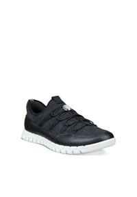 Zwart-grijze gebreide sneaker met witte gestructureerde zool, elastische veter en aantreklipje op de hiel, schuin weergegeven om zij- en vooraanzichten te tonen.