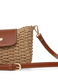 Woven straw bag with a brown leather flap and strap, featuring a gold snap closure and contrasting white stitching.