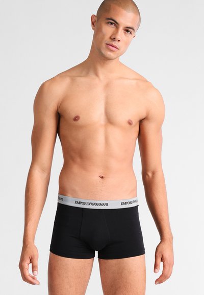 Čierne bavlnené boxerky s šedým elastickým pásom s logom "Emporio Armani". Úzky strih s hladkou textúrou.