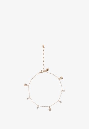 Arany színű lánc karkötő kagyló alakú medálokkal és kristály díszítésekkel. Csattal rendelkezik, és állítható hosszúságú, lánc kiterjesztéssel.