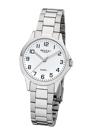 Montre-bracelet en quartz en métal argenté avec cadran blanc, chiffres noirs et trois aiguilles indiquant 10:10:37.