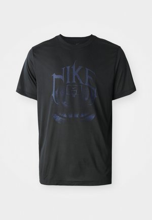 Black Nike basketball T-shirt featuring a large blue logo graphic, crew neck, short sleeves, and lightweight fabric.