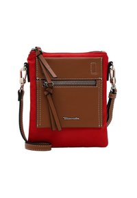 Red fabric crossbody bag with brown leather front pocket, silver hardware, and accent stitching. Includes a detachable strap and tassel.