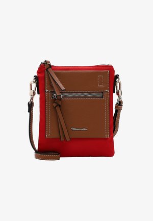 Red fabric crossbody bag with brown leather front pocket, silver hardware, and accent stitching. Includes a detachable strap and tassel.
