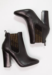 Guess Bottines à talons hauts - black