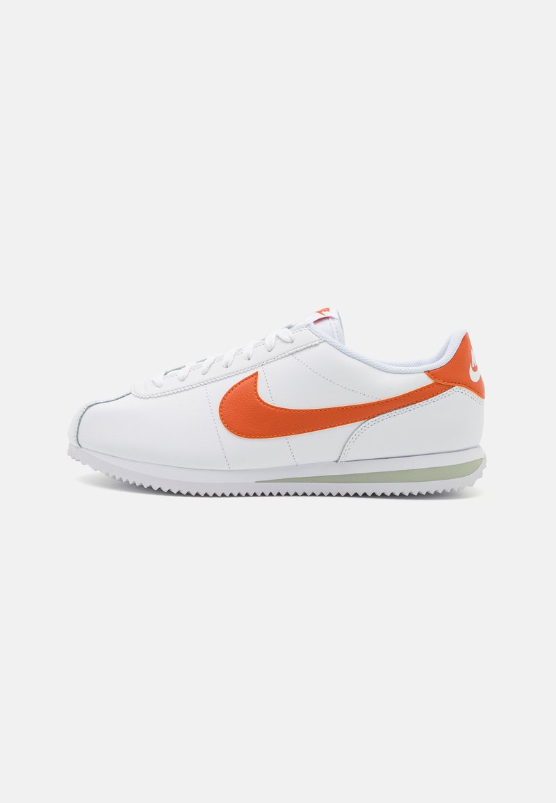 orange and white nike cortez