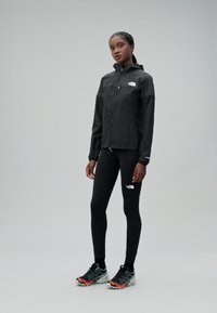The North Face HIGHER RUN WIND JACKET - Veste de running - black
