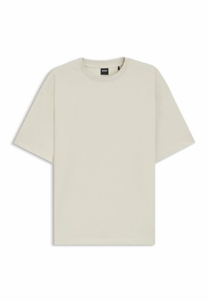 Helles beiges T-Shirt aus weicher Baumwolle, mit entspannter Passform, Rundhalsausschnitt und kurzen Ärmeln. Keine sichtbaren Muster oder Akzente.