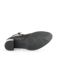 Schwarzer Lederschuh mit glatter Oberfläche, abgerundetem Zeh, mittelhohem Absatz und strukturiertem Gummisohle. Verfügt über einen seitlichen Reißverschluss und das Markenlogo.