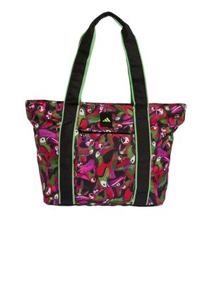 Tote bag with black and green handles, featuring a colorful tropical bird pattern in red, pink, green, and black with a front zipper pocket.