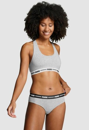 Grau Sport-BH und passende Pantys, aus Baumwollmischung, mit einem schwarzen elastischen Taillenbund mit weißem "PUMA"-Logo, glatte Textur und taillierte Passform.
