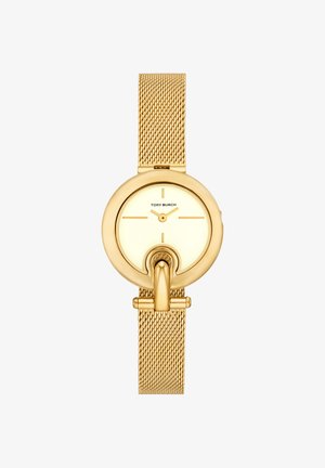 Guldtonet Tory Burch armbåndsur med mesh-armbånd, rundt minimalistisk urskive og unikt hesteskoformet detalje i nederste midte.