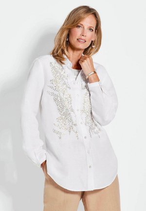 Weißes Button-Down-Hemd mit aufwendigen goldenen Verzierungen, langen Ärmeln, einem Kragen und einem leicht geschwungenen Saum. Leichter Stoff.