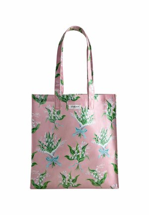 Pink tote bag made of fabric featuring a floral pattern with white flowers and green leaves, accented with blue bows. Two long handles.