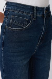 Dark blue denim jeans with five-pocket design, visible stitching, and a high-waisted fit. The fabric appears smooth with a slight stretch.
