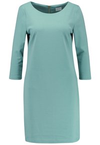 En havsfärgad, knälång klänning i mjukt tyg, med trekvartsärmar, rundad halsringning och en dragkedja bak.