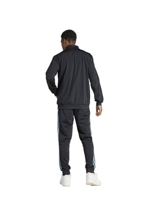 Tuta sportiva nera con maniche lunghe e pantaloni, caratterizzata da strisce laterali blu chiaro, realizzata in tessuto liscio, con polsini e vita elasticizzati.