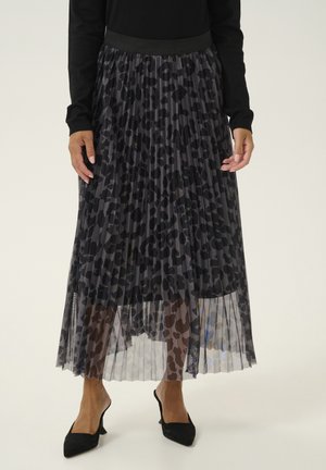 Jupe midi noire plissée avec un motif léopard, fabriquée en tissu léger, dotée d'une taille noire unie et d'une texture transparente.
