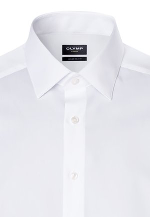 White dress shirt with a modern fit, featuring a spread collar, button placket, and a label reading "OLYMP LUXOR" inside the collar.