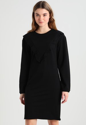 Schwarzes langärmeliges Kleid mit einem V-Ausschnitt und Rüschen sowie einer figurschmeichelnden Silhouette, gefertigt aus weichem, angenehmem Stoff.