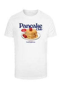 White cotton t-shirt featuring an illustration of stacked pancakes with syrup and raspberries, text reading "Pancake Club" in blue.
