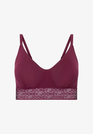 Sostén inalámbrico burdeos con tirantes ajustables y una banda de logo texturizada. Tejido suave con un acabado blando y copas sin costuras para mayor comodidad.