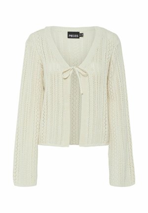 Neulejakku luonnonvalkoisena, jossa on V-pääntie, pitkät hihat, avoin etuosa ja solmimisclosure. Sisältää tekstuurisen, avoimen neulekuvion.