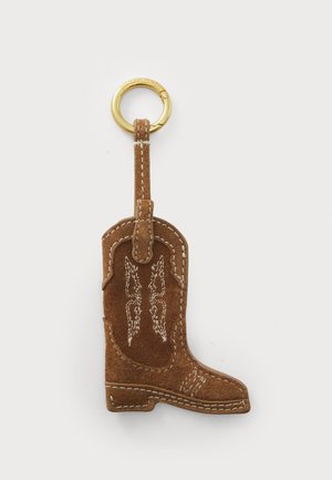 Brown suede cowboy boot keychain with golden keyring, featuring white stitching and decorative patterns on the boot shaft.