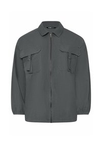 Veste grise zippée avec col, dotée de deux poches poitrine et de poignets élastiqués. Fabriquée en tissu lisse avec un design minimaliste.