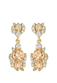 Boucles d'oreilles plaquées or avec deux cristaux jaunes arrondis et de plus petits cristaux transparents disposés en motif floral, avec un design pendante.