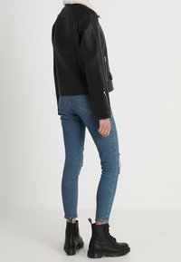 Even&Odd Giacca in similpelle - black