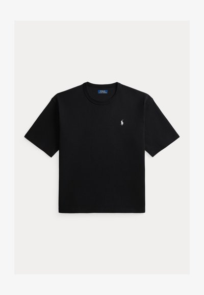 T-shirt noir à manches courtes avec col rond et petit logo cheval blanc Polo Ralph Lauren sur le côté gauche de la poitrine.