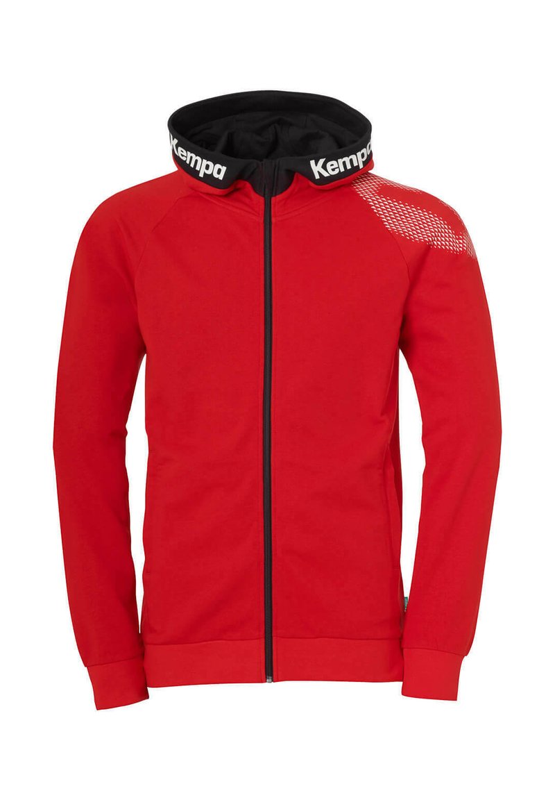 Rode zip-up sweatshirt met een zwarte capuchon, voorzien van een witte "Kempa" logo op de kraag en een stippenpatroon op de linkerschouder.
