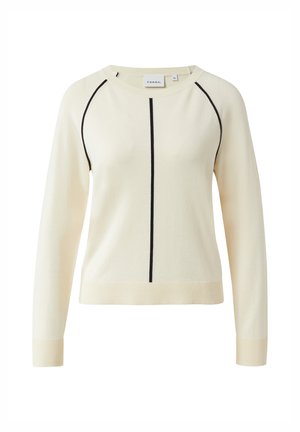 Cremefarbener Pullover mit langen Ärmeln, schwarzem vertikalem Streifen in der Mitte und schwarzer Paspelierung entlang der Raglanärmel, mit Rippbündchen an Ärmelenden und Saum.