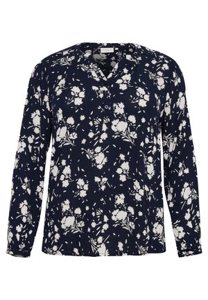 Marinebluse med et blomstermønster i hvid. Har lange ærmer, en klippet krave og knaplukning. Teksturstof, afslappet pasform.