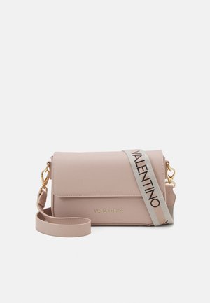 Pink synthetic leather crossbody bag with a gold logo and adjustable decorative strap. Features a flap closure and sleek rectangular design.
