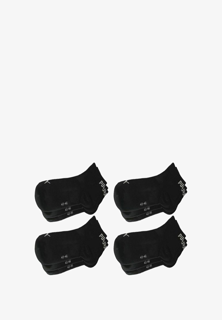 Schwarze Baumwollsocken, Packung mit vier Paaren, Größe 43-46. Merkmale umfassen gerippte Bündchen und minimales Logo-Design. Glatte Textur, standardmäßiges sportliches Design.