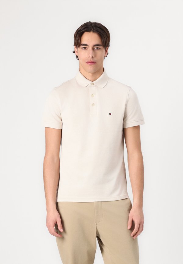 SLIM - Polo shirt - newsprint