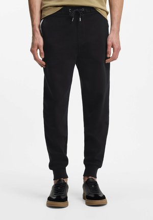 LOCSIN - Jogginghose - black one