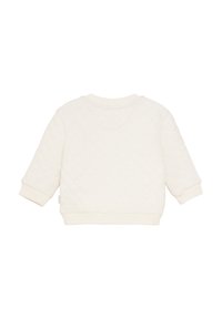 Sweatshirt crème matelassé avec un col rond et des poignets côtelés. Texture douce, coupe décontractée, sans motifs ni graphismes visibles.