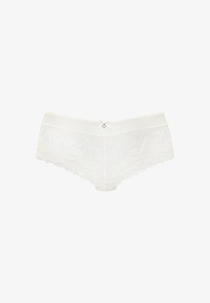 White lace women's hipster panties with floral patterns, scalloped edges, and a small bow with a charm at the waistband center.