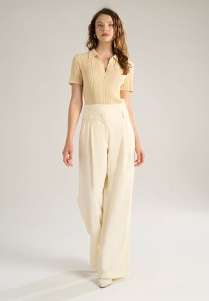 STRAIGHT - Trousers - butter