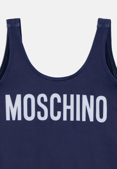 Navy blue tank top featuring white "MOSCHINO" logo. Smooth texture with thin straps and a rounded neckline. No additional patterns or accents.