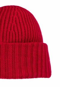 Red knitted beanie with a ribbed texture, featuring a folded cuff and seamless top. Warm material suitable for cold weather.