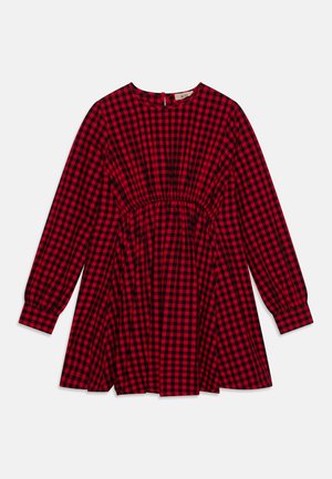 Red and black checked dress with long sleeves, gathered waist, round neckline, and a button closure at the back.